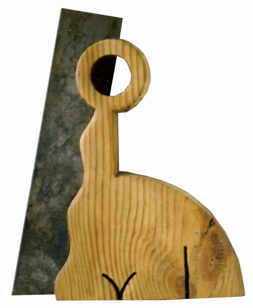 Artwork titled "Chica de Inma" made with wood, iron in the year 1997 by Juan Diego Miguel