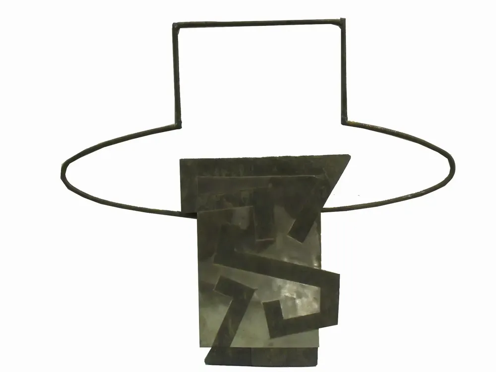 Artwork titled "Cabeza tocada-3" made with sheet, slate stone, wire in the year 1997 by Juan Diego Miguel