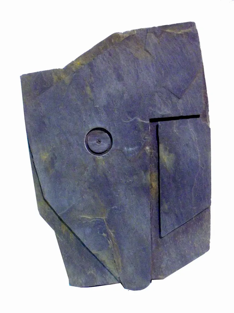 Artwork titled "Cabeza negra-3" made with slate stone in the year 1991 by Juan Diego Miguel