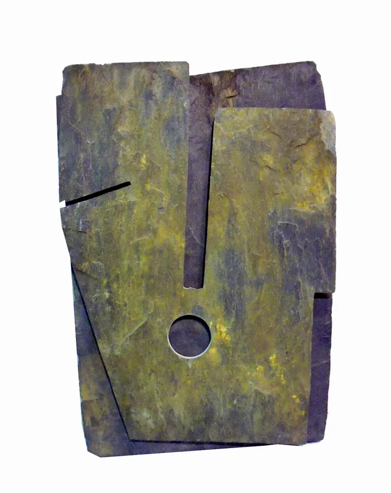 Artwork titled "Cabeza negra-12" made with slate stone in the year 1991 by Juan Diego Miguel