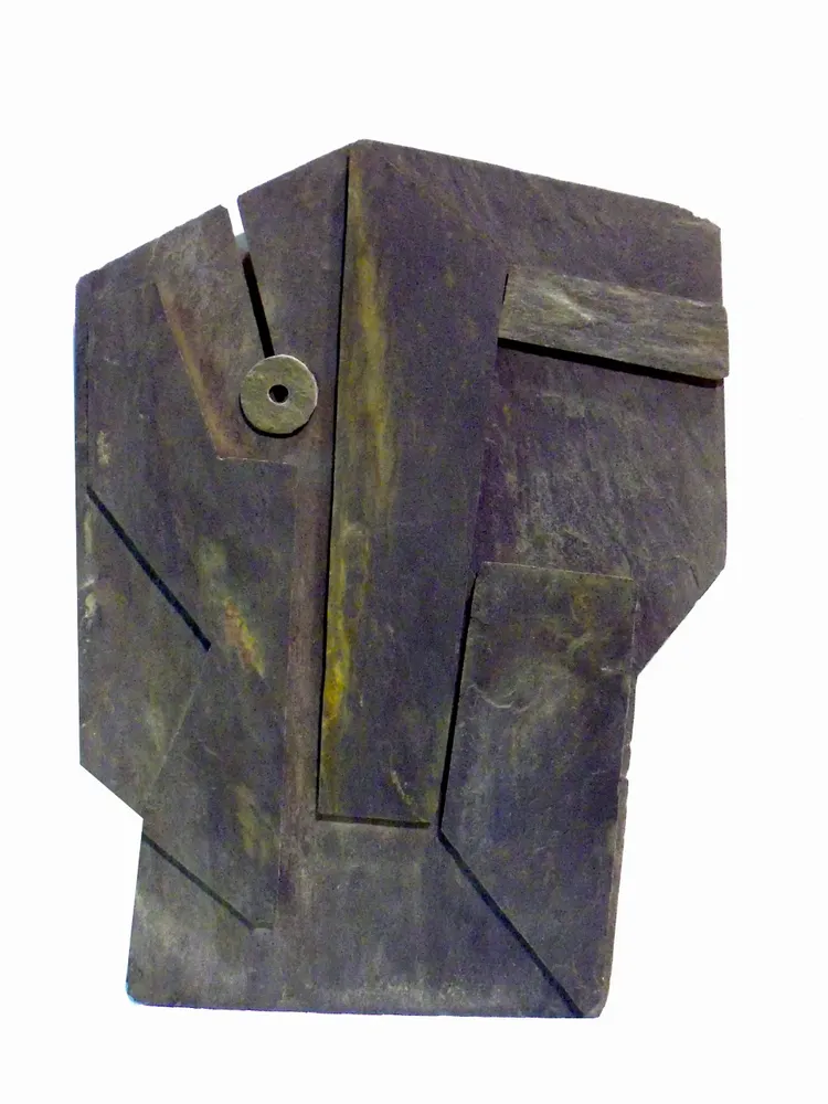 Artwork titled "Cabeza negra-14" made with slate stone in the year 1991 by Juan Diego Miguel