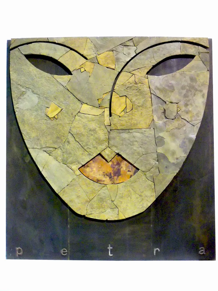 Artwork titled "Petra" made with limestone, copper, brass in the year 2000 by Juan Diego Miguel