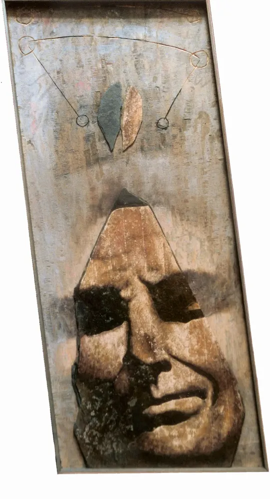 Artwork titled "Cara-2" made with oil painting, slate stone, plywood in the year 1986 by Juan Diego Miguel