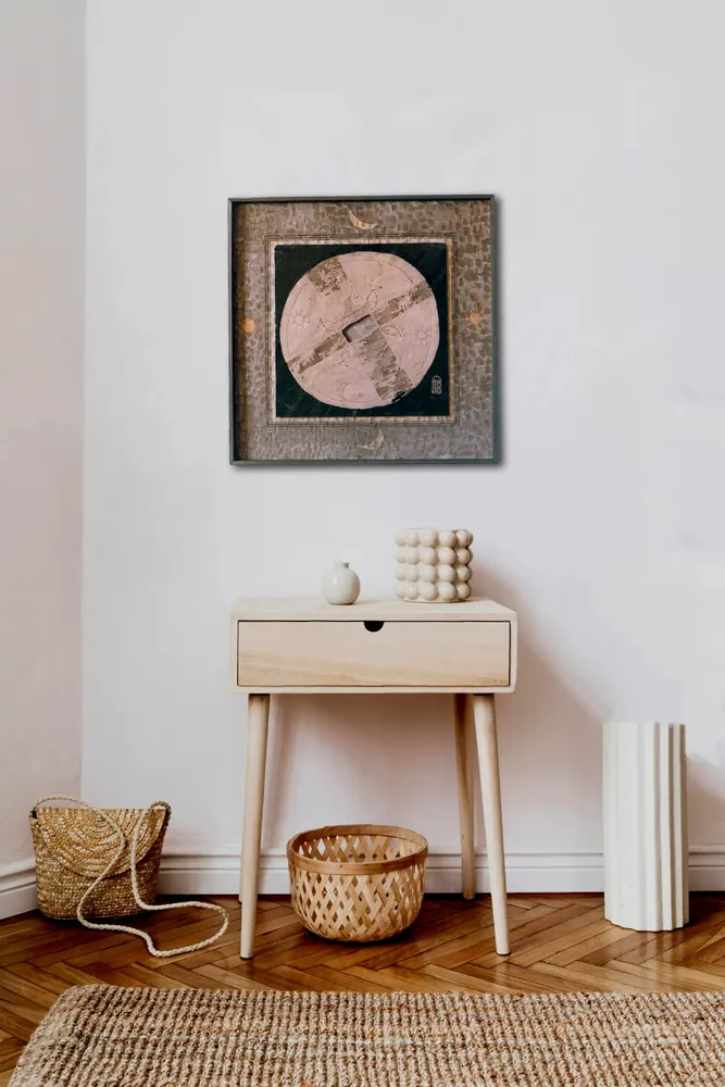 Artwork titled "Rueda gris" made with oil painting, slate stone, plywood in the year 1985 by Juan Diego Miguel
