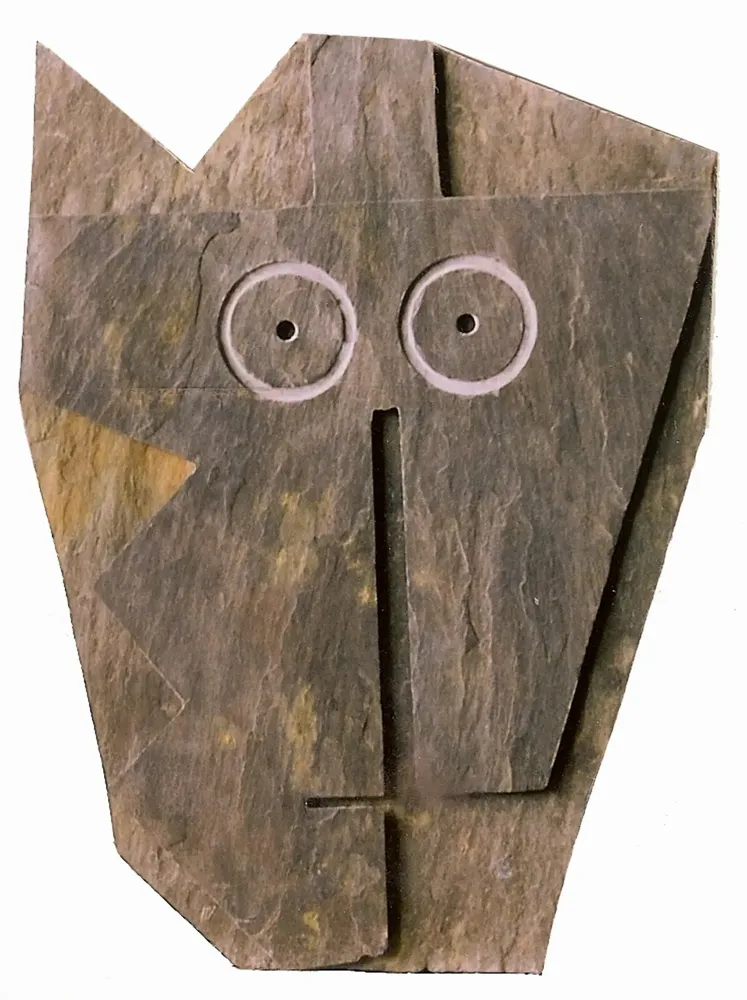 Artwork titled "Cabeza negra" made with slate stone in the year 1991 by Juan Diego Miguel