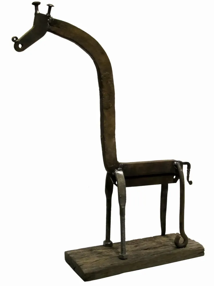 Artwork titled "Jirafa" made with wood, iron in the year 2012 by Juan Diego Miguel