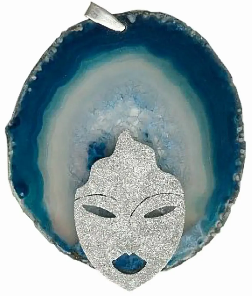 Artwork titled "Cara de plata-66" made with silver, agatha stone in the year 2003 by Juan Diego Miguel
