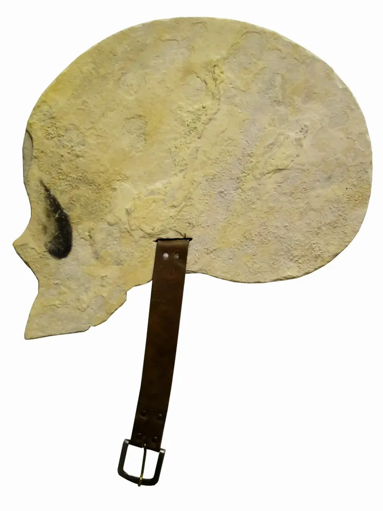Artwork titled "Casco" made with pencil, limestone, leather, metal in the year 2013 by Juan Diego Miguel