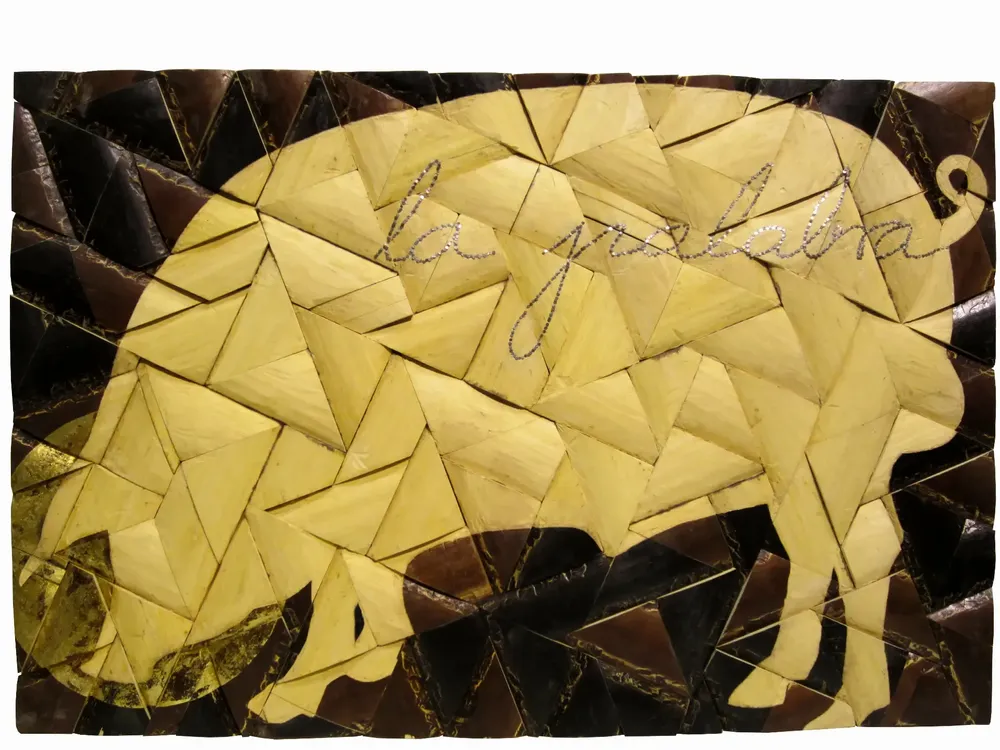 Artwork titled "La palabra" made with gold leaf, iron, frames in the year 2013 by Juan Diego Miguel