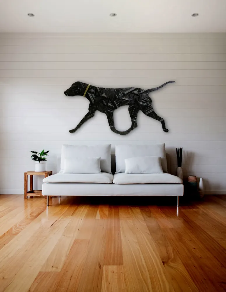 Artwork titled "Perro negro" made with brass, synthetic enamelled paint, frames in the year 2015 by Juan Diego Miguel