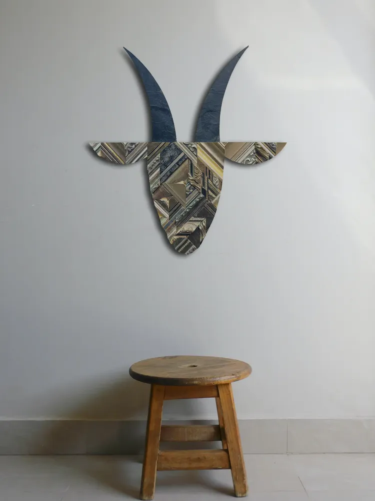 Artwork titled "Cabra" made with bakelite, frames in the year 2021 by Juan Diego Miguel