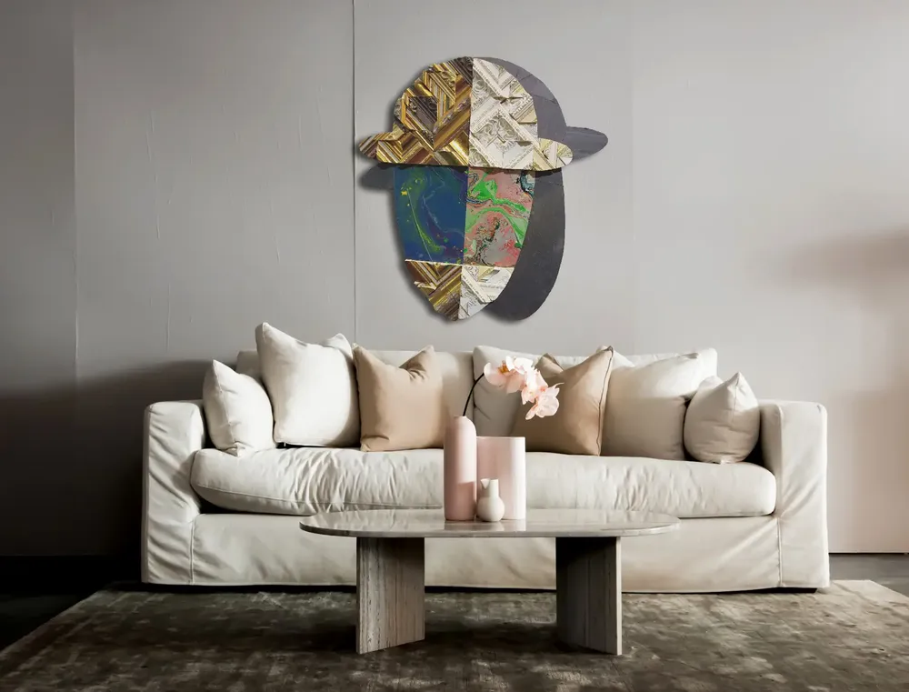 Artwork titled "Cabeza doble" made with synthetic enamelled paint, laminate, frames, slate stone, stainless steel in the year 2021 by Juan Diego Miguel