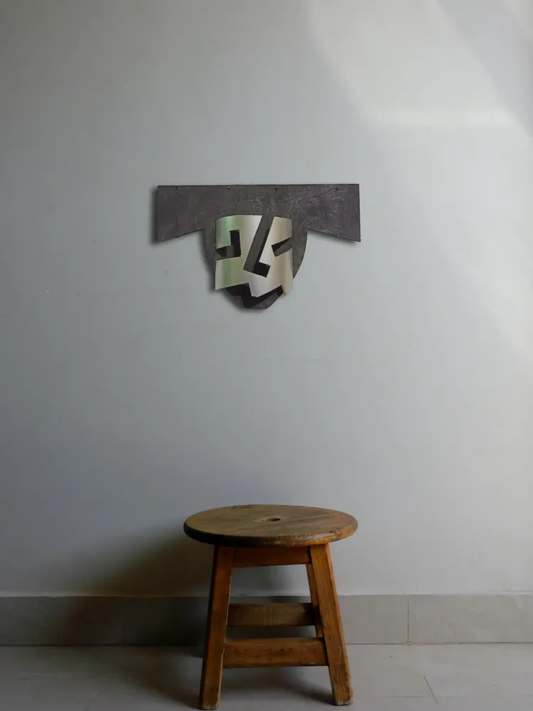 Artwork titled "Careta rota" made with synthetic enamelled paint, plastic, plywood in the year 2022 by Juan Diego Miguel