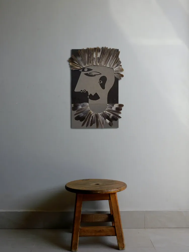 Artwork titled "Palomo" made with Feathers, synthetic enamelled paint, cardboard in the year 2022 by Juan Diego Miguel