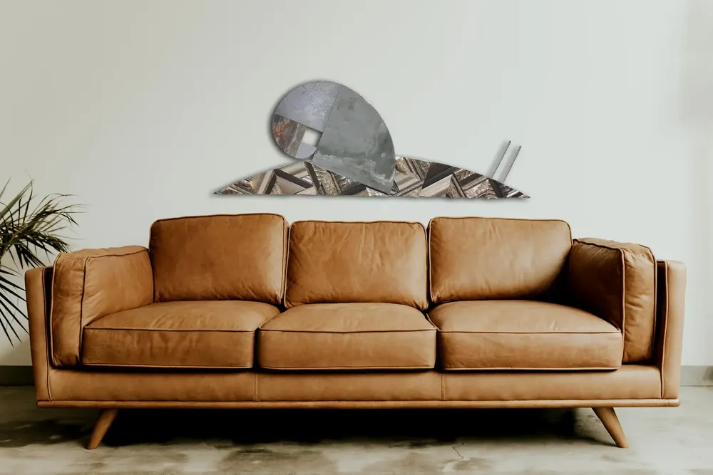 Artwork titled "Caracol" made with stainless steel, zinc, iron, frames in the year 2023 by Juan Diego Miguel