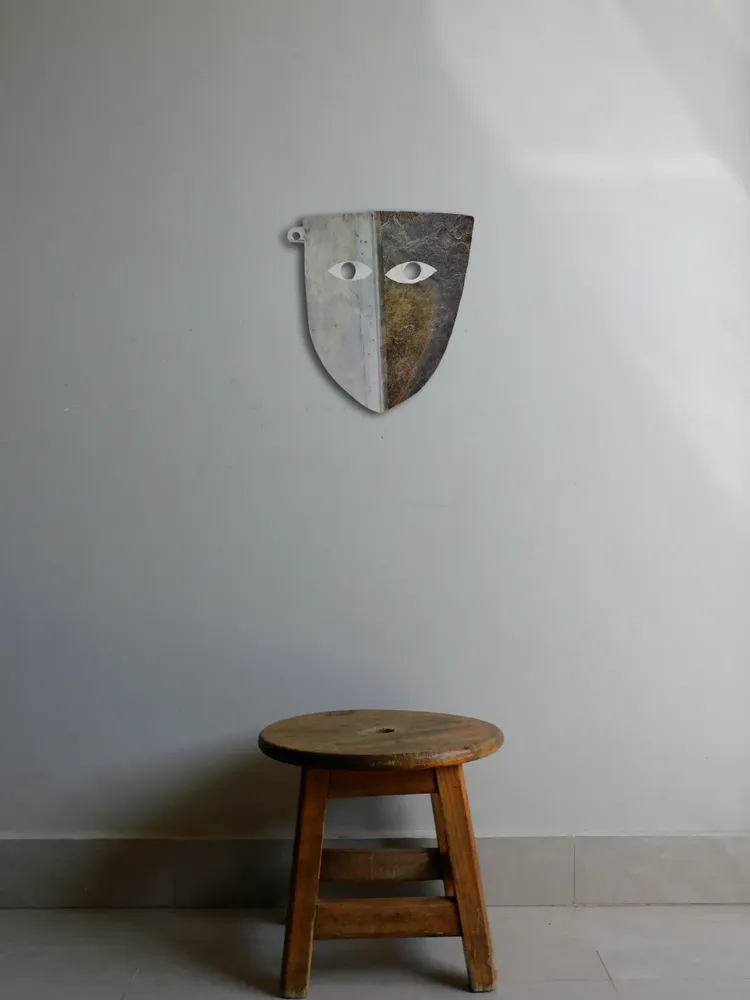 Artwork titled "Careta" made with synthetic enamelled paint, zinc, slate stone in the year 2023 by Juan Diego Miguel