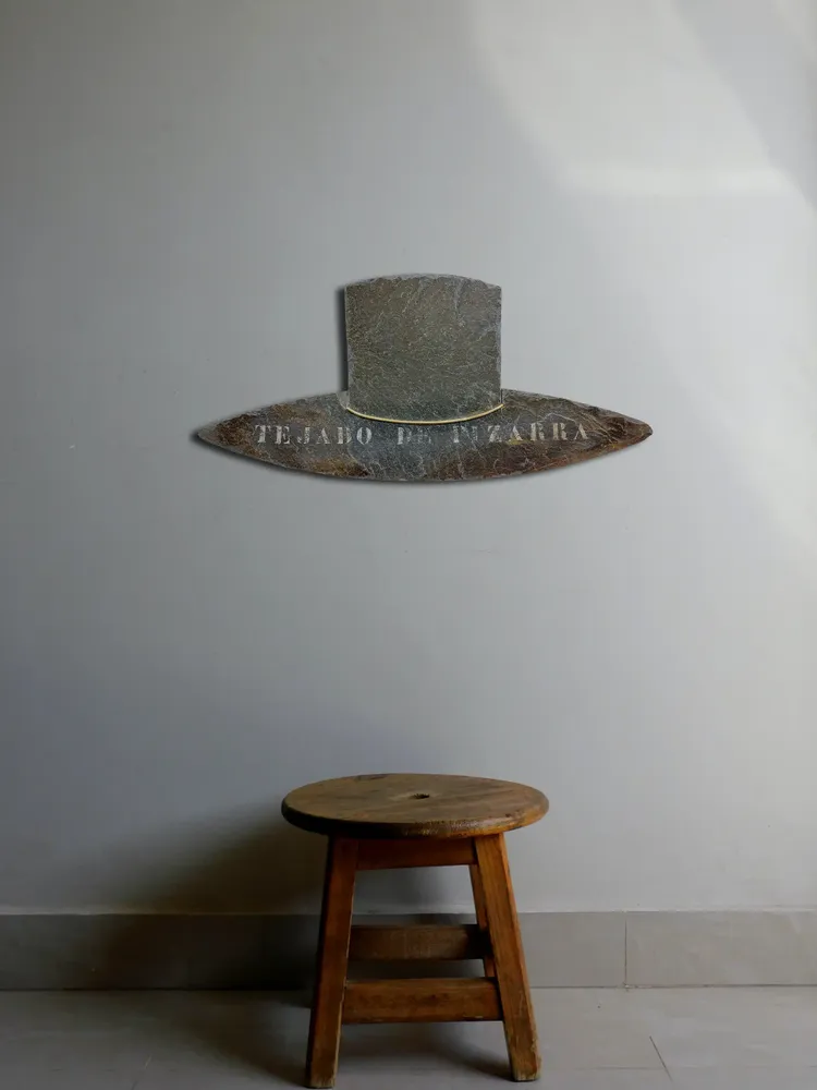 Artwork titled "Tejado de pizarra" made with synthetic enamelled paint, slate stone, brass in the year 2023 by Juan Diego Miguel