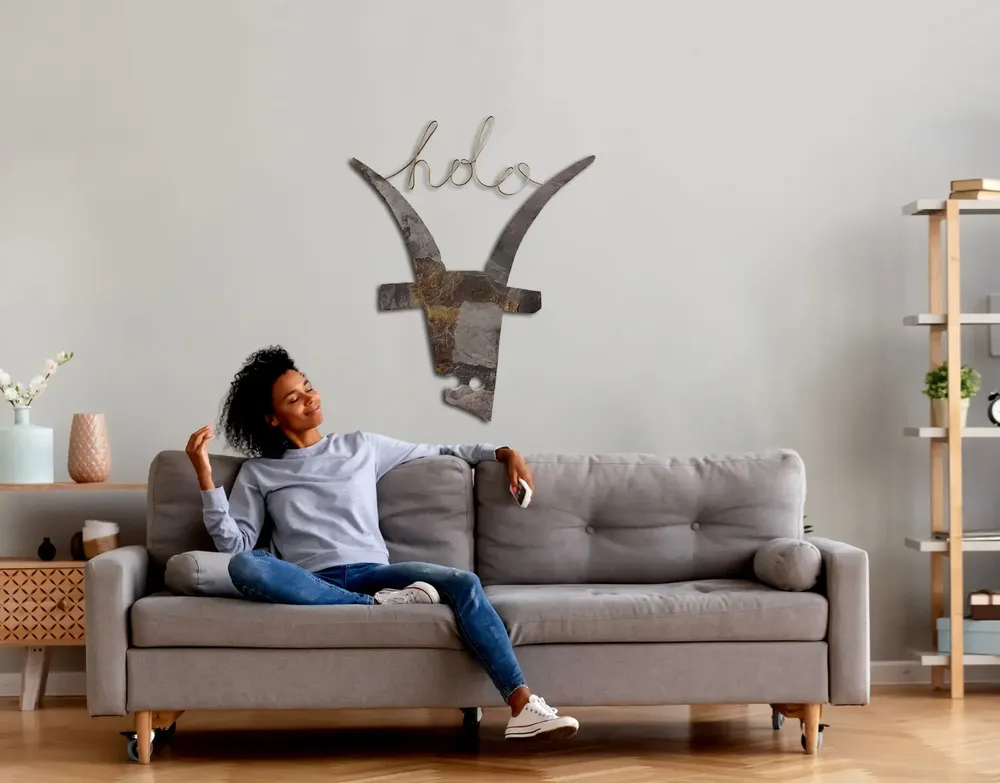 Artwork titled "Hola cabra" made with slate stone, brass in the year 2023 by Juan Diego Miguel