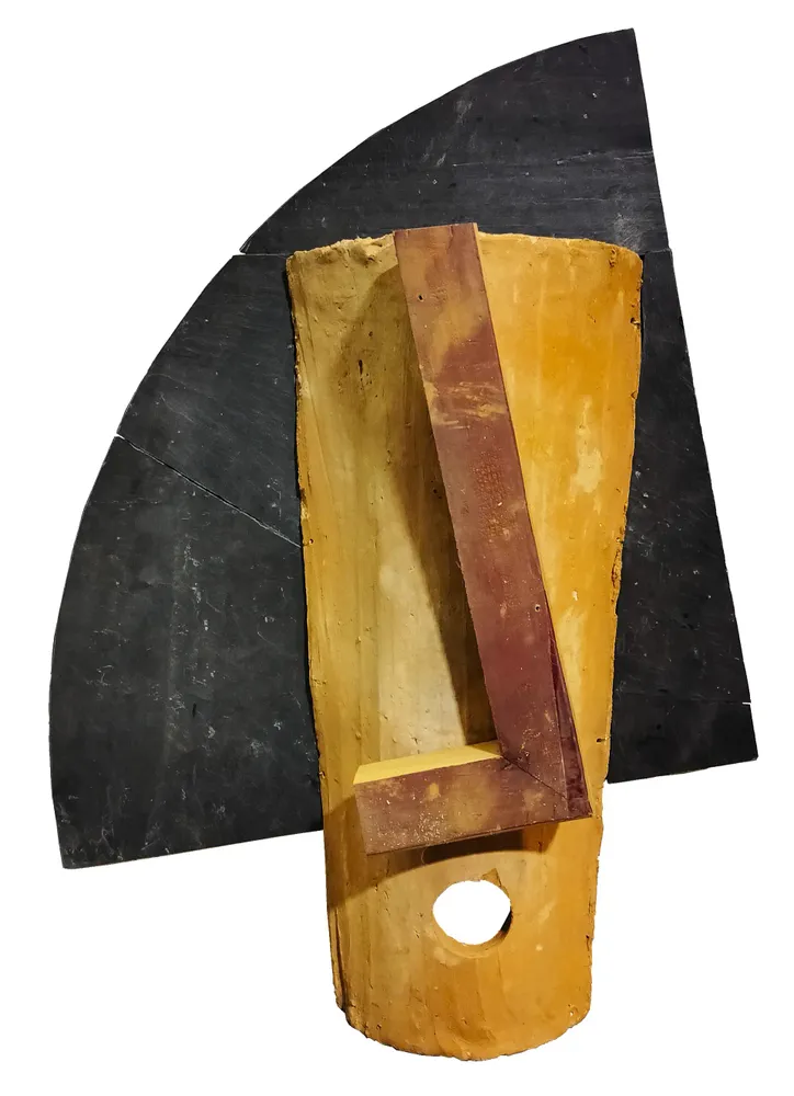 Artwork titled "Cabeza" made with wood, ceramic, slate stone, brass in the year 2023 by Juan Diego Miguel