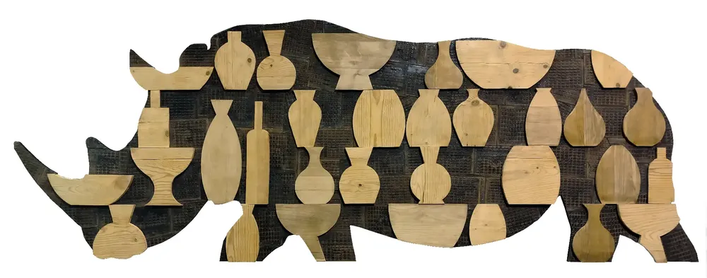 Artwork titled "Rinoceronte en cacharreria" made with wood, iron, rubber in the year 2023 by Juan Diego Miguel