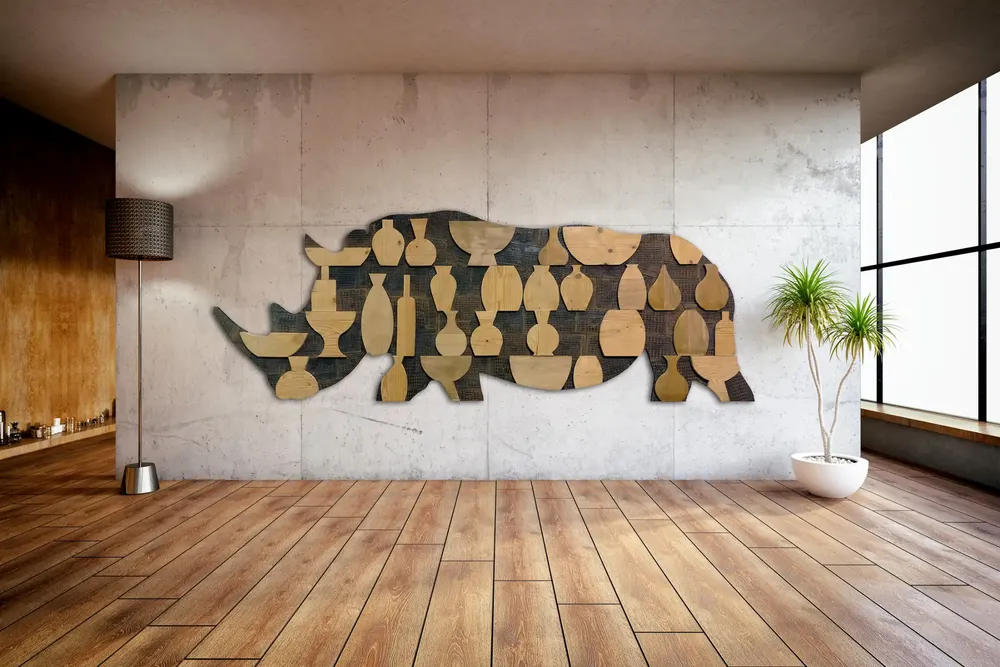 Artwork titled "Rinoceronte en cacharreria" made with wood, iron, rubber in the year 2023 by Juan Diego Miguel