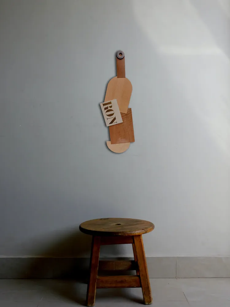 Artwork titled "Botella RON" made with synthetic enamelled paint, laminate, iron in the year 2024 by Juan Diego Miguel