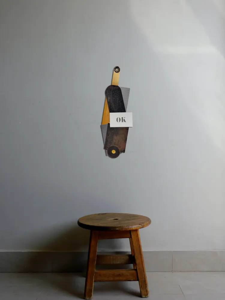 Artwork titled "Botella OK" made with iron, synthetic enamelled paint, laminate, rubber, mdf in the year 2024 by Juan Diego Miguel