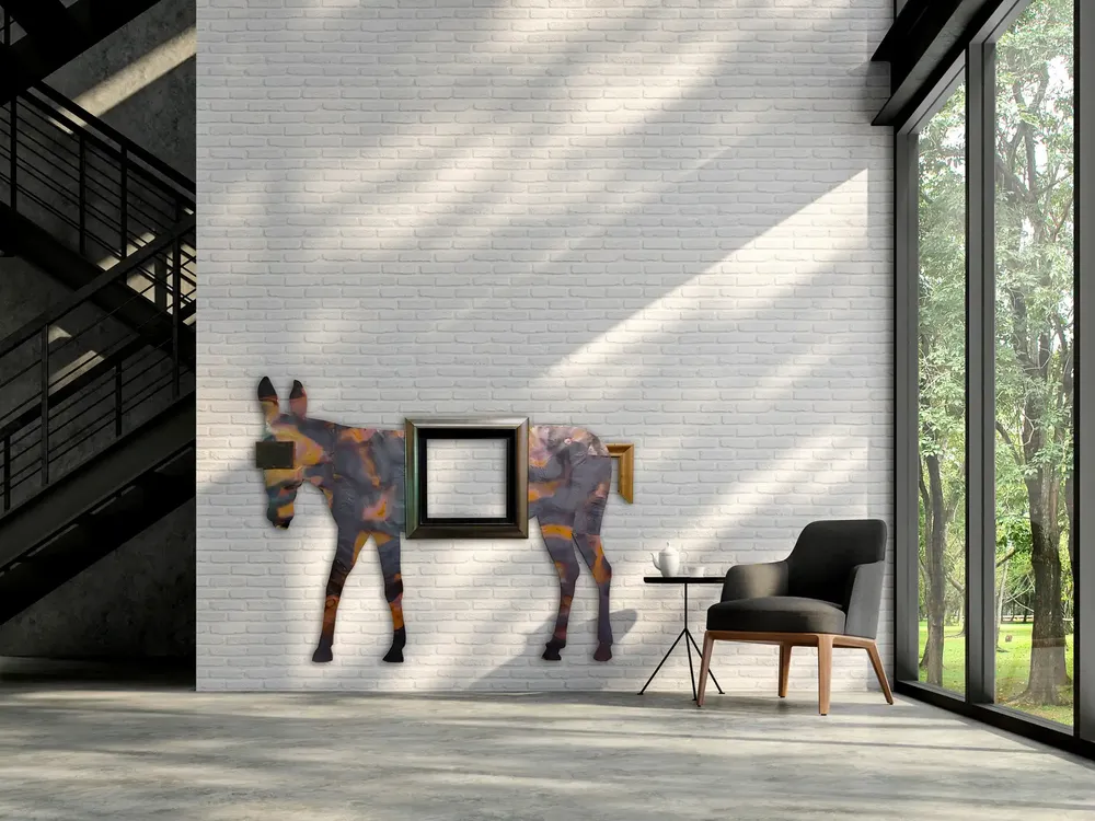 Artwork titled "Burro" made with rubber, frames, copper in the year 2024 by Juan Diego Miguel