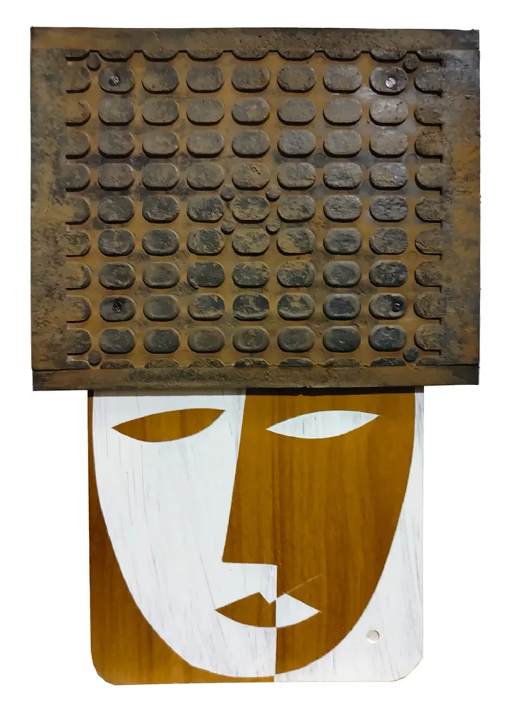 Artwork titled "Cabeza" made with synthetic enamelled paint, laminate, rubber, iron in the year 2024 by Juan Diego Miguel