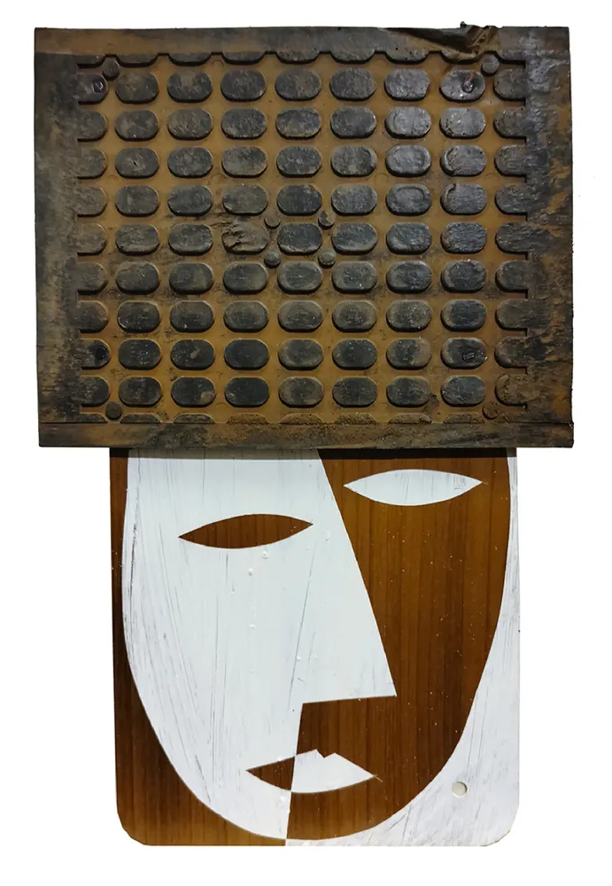 Artwork titled "Cabeza" made with synthetic enamelled paint, laminate, rubber, iron in the year 2024 by Juan Diego Miguel