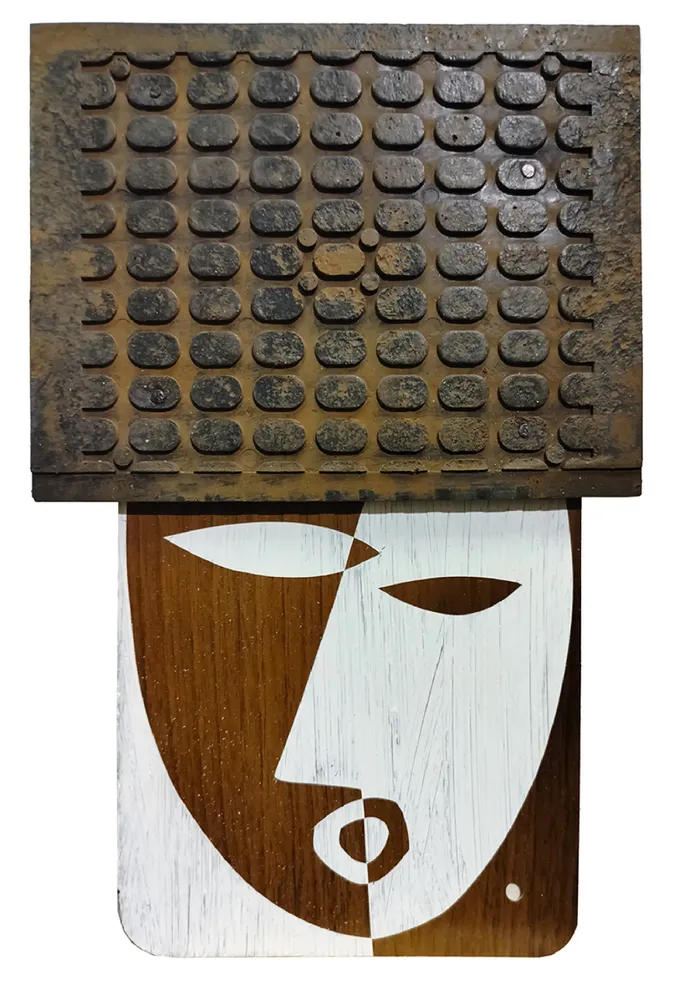 Artwork titled "Cabeza" made with synthetic enamelled paint, laminate, rubber, iron in the year 2024 by Juan Diego Miguel