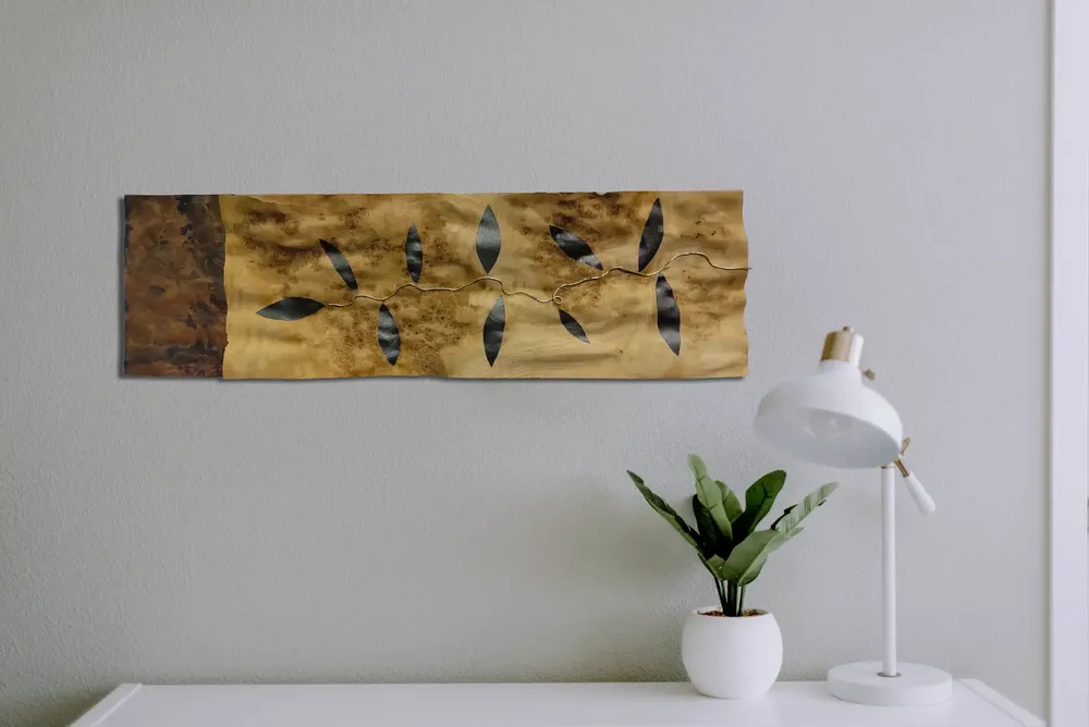 Artwork titled "Rama" made with copper, brass, graphite, wood in the year 2024 by Juan Diego Miguel