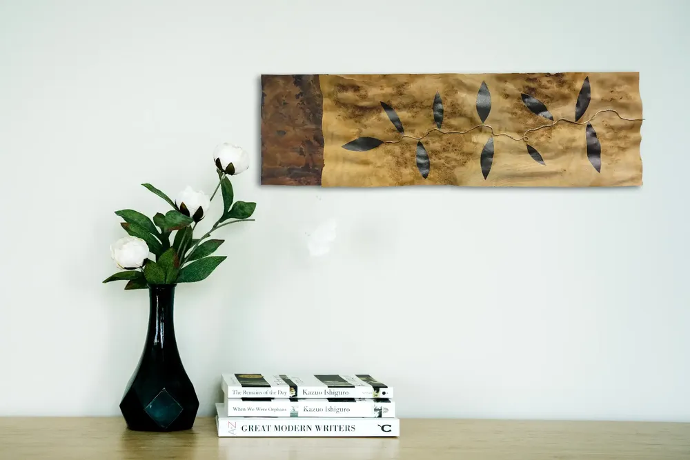 Artwork titled "Rama" made with copper, brass, graphite, wood in the year 2024 by Juan Diego Miguel